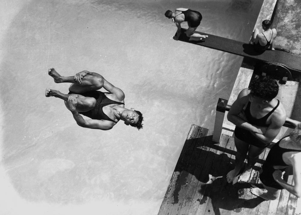 1938 - Diving from a tower at the Valley swimming pool. The Baths are in Wickham Street, Fortitude Valley, Brisbane (State Library of Queensland, Australia)