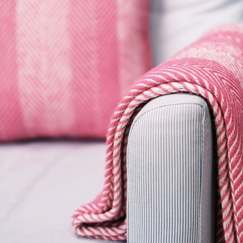Conscious Convert Natural Herringbone Organic Cotton Throw Blanket in Pink
